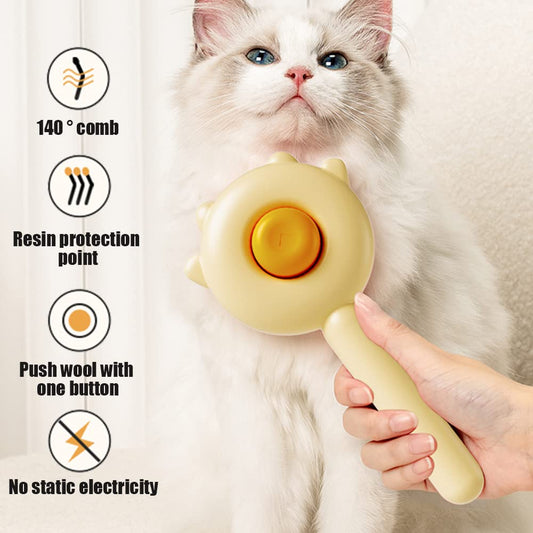 A fluffy white cat is being brushed with a pale yellow egg-shaped pet grooming brush held by a human hand. The image includes four feature callout icons and text on the left: 140° comb, resin protection point, push wool with one button, and no static electricity.