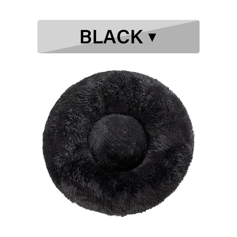 Black fluffy donut cushion with a label indicating 'BLACK' on a white background
