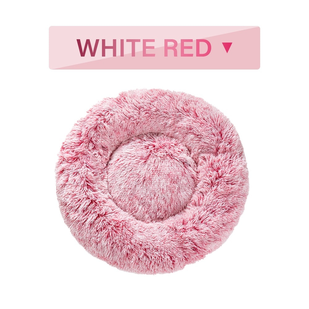 Pink fluffy pet bed with 'White Red' label on a white background